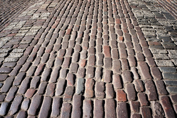 Old traditional stone sett paving.