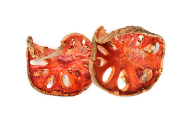 Dry bael fruit isolated on white background.