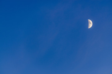 half moon in the sky