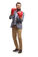 Bearded man with boxing gloves standing in guard