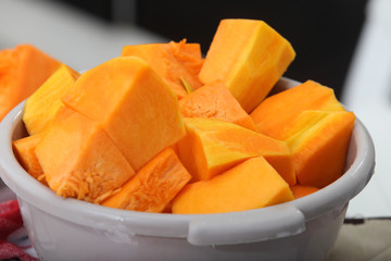 autumn vegetables from the garden, pieces of pumpkin cut into slices