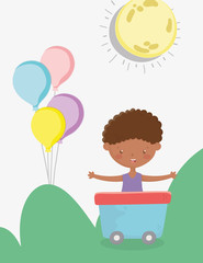 Fototapeta premium kids zone, cute little boy in wagon with balloons outdoors