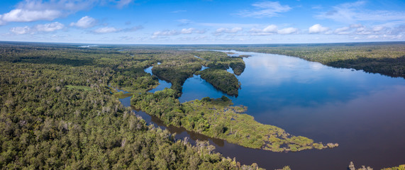 Beautiful aerial drone panoramic view of Xingu river in the Amazon rainforest on sunny summer day...