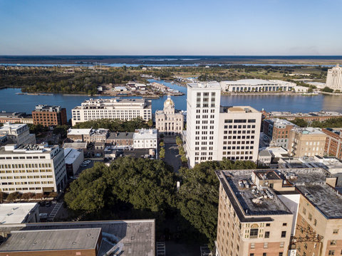 Aerial view of downtown Savannah, Georgia with city hall at the center.