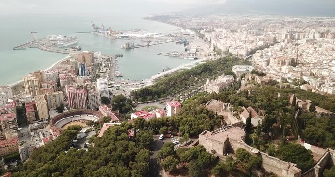 Malaga with Placa de Torros from castle in sunny time. Andalusia, Spain 