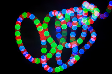 Abstract blurred leds garland for background. Festiv wallpaper.