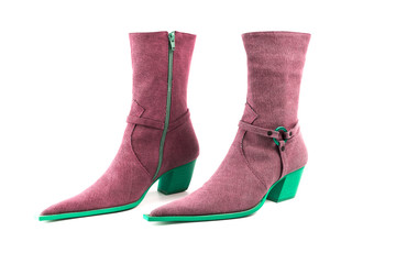 Female green and pink leather boots on white background, isolated product, top view.