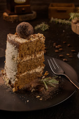 Slice of delicious naked coffee and hazelnuts cake