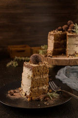 Slice of delicious naked coffee and hazelnuts cake