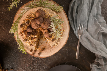 Slice of delicious naked coffee and hazelnuts cake