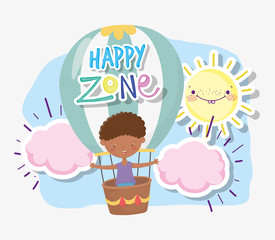 kids zone, cute little boy flying in hot air balloon