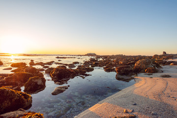gorgeous sunset on a rocky rugged coast