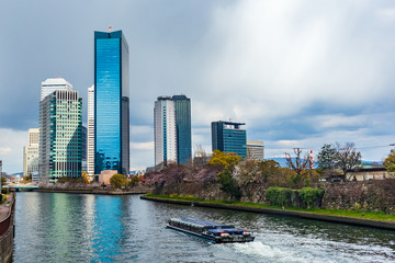 Fototapeta premium Osaka Business Park seen from the bridge over the Neyagawa River