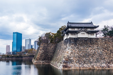 Osaka Castle outer moat and Osaka buildings