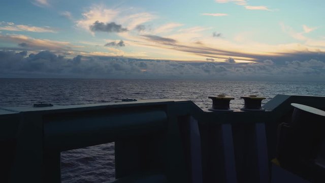 FPSO tanker vessel near Oil Rig platform. Offshore oil and gas industry. Flare is burning with smoke. View from supply vessel.