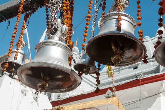 Large temple bells at the temple of Goddess Ganga in Gangotri, India.