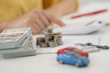 Sales manager giving advice application form document, considering mortgage loan offer for car and house insurance