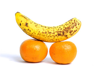 oranges and bananas on a white background