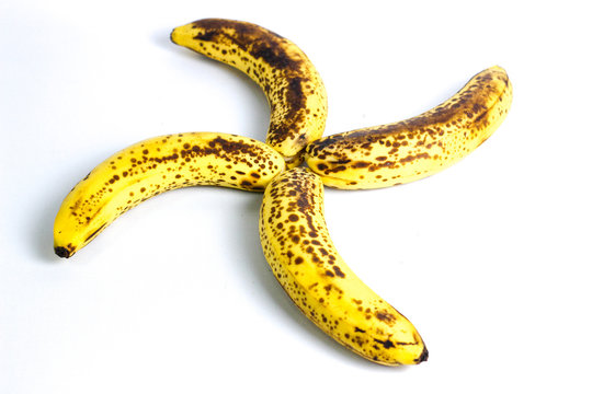 Organic bananas with freckles on fruit peels