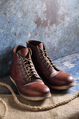 Safety shoes on rustic background, Safety leather shoes in a store