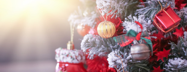Blurry of Christmas and New Year's balls with beautiful decorations on the Christmas tree, soft light, beautiful background images and illustrations.