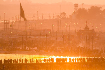 ALLAHABAD, INDIA - FEB 10 - Hindu pilgrims cross pontoon bridges into the massive campsite during...