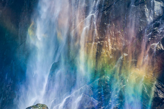 A rainbow shining in of the mist of a waterfall in south India - Jog Falls.