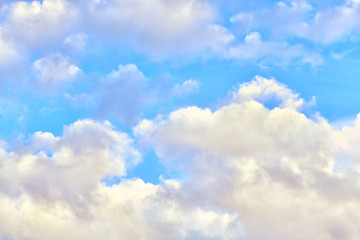 Beautiful blue sky with clouds on a bright day. Horizontal photography