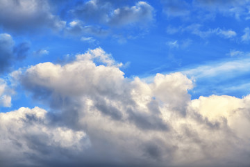 Fototapeta na wymiar Gloomy beautiful blue sky with clouds on a bright day. Horizontal photography