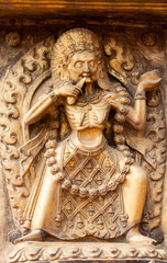 A gilded relief of the Hindu Goddess Kali on the Golden Gate in Bhaktapur, Nepal.