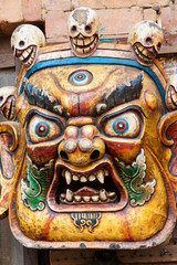 A young brahmin sits in meditation on a river bank.