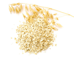 Flat lay, top view oats and oatmeal. Oat seeds are, oatmeal flakes isolated on white with a shadow. Oat seeds, dry rolled oats isolated on a white background. Ear of oats and cereal on white.