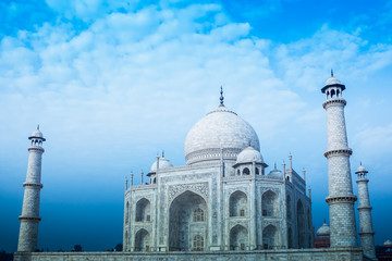 The Taj Mahal of India seen from a side angle up close.