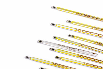 Closeup and crop small medical thermometers line up isolate on white background.