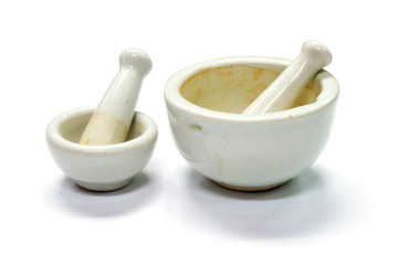 Herbs and medicine white mortars, Made by lime or ceramic on white background.