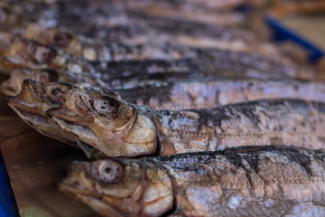 Baikal fish hot smoked and dried on the street market. Listvyanka, Siberia, Russia