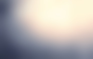 Obraz premium Delicate yellow sunshine on grey cloudy sky blur background. Warm glow on cold metal abstract illustration. 