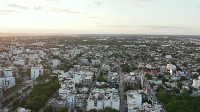 4k Aerial City Flyover with Sunset in the Background