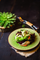 seafood salad with green and red leaf lettuce