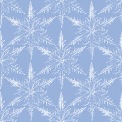 Large Snowflake Print Pattern. Seamless Rapport for Winter Holiday Background, Print, Textile, and Gift Wrap.