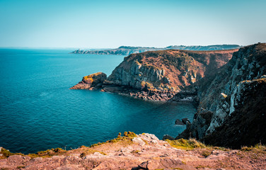 Cape Frehel lighthouse (Phare Du Cap Fréhel), France. Sunset time at maritime lighthouse and...