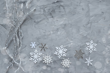 Christmas gray texture background Paper snowflakes