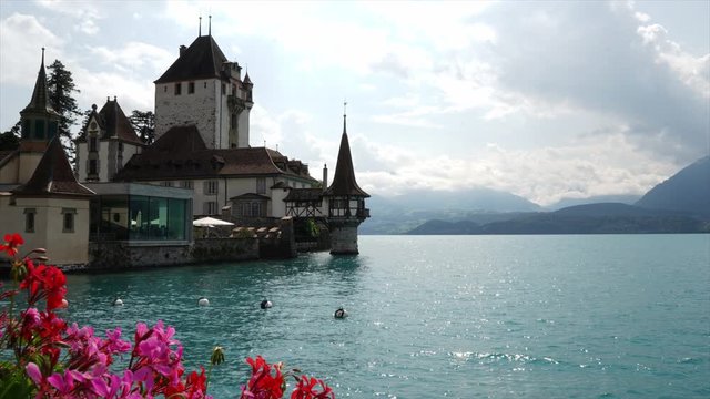 Timelapse Oberhofen Castle with Thun Lake background in Switzerland