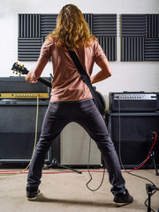 Guitarist playing in the recording studio