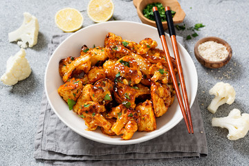 Buffalo Cauliflower . Popular Baked Cauliflower with barbeque sauce. Barbecue Cauliflower Wings . Vegan Food.