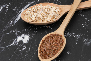 Seeds on a wooden spoon close up