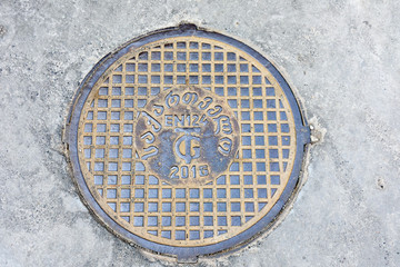 Tbilisi, Georgia-May, 07 2019: Manhole with georgian letters on Tbilisi street