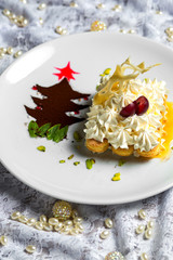 finger cookies decorated with cream served in sauce near small coffee powder tree