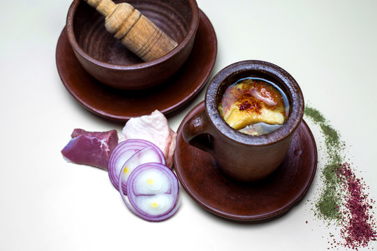 bozbash in piti ceramic clay pot in white background