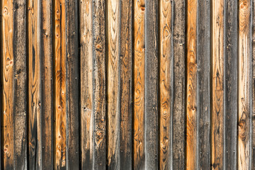 Background, rustic, weathered brown orange and black wooden wall